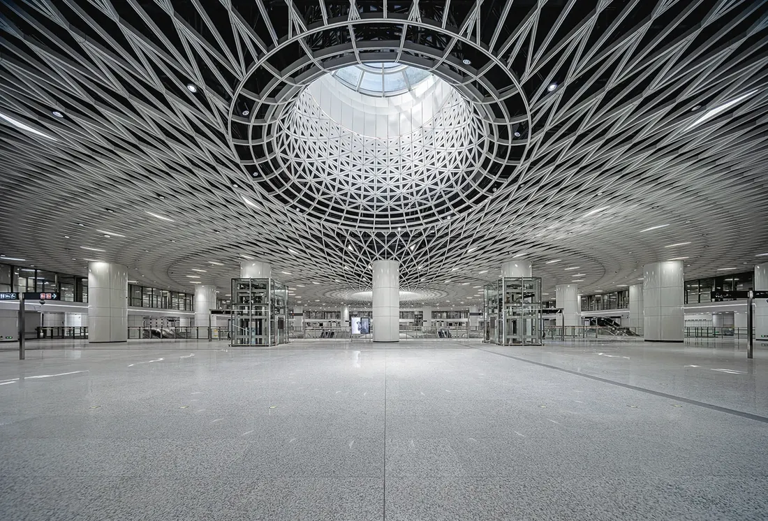 Gangxia North hub: the 'Eye of Shenzhen' lattice skylight above the main concourse